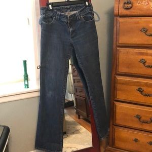 The limited back button pocket jeans